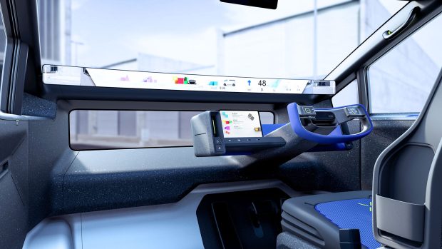 Intérieur du fourgon concept Toyota Kayoibako EV 2023, montrant un écran pleine largeur