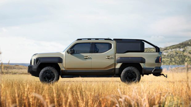 Angle latéral Kia Tasman 2025 avec auvent arrière